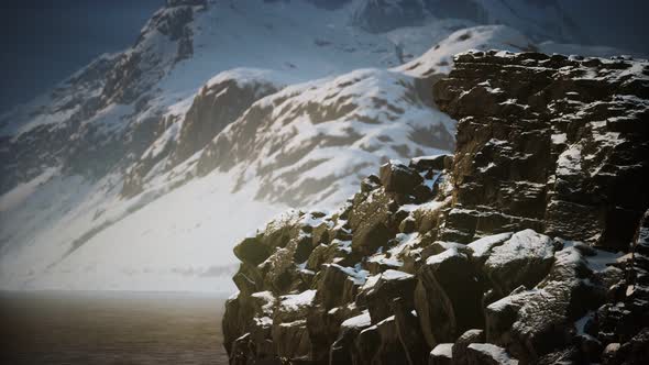 Snow Covered Mountains in Northern Ocean