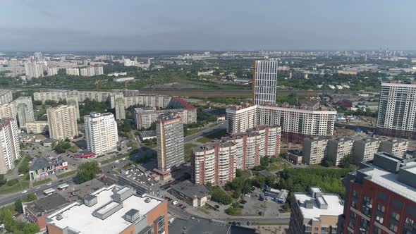 Aerial view of new modern high-rise buildings and old panel houses 06