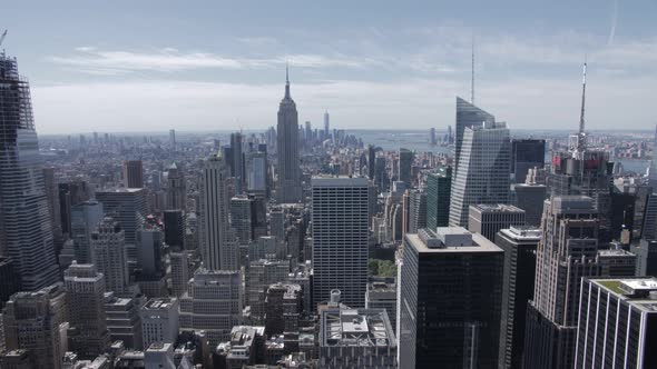 handheld pan shot of Manhattan from Rockfeller Center on a cloudy day