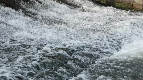 Rapid flow of river water due to rising water levels