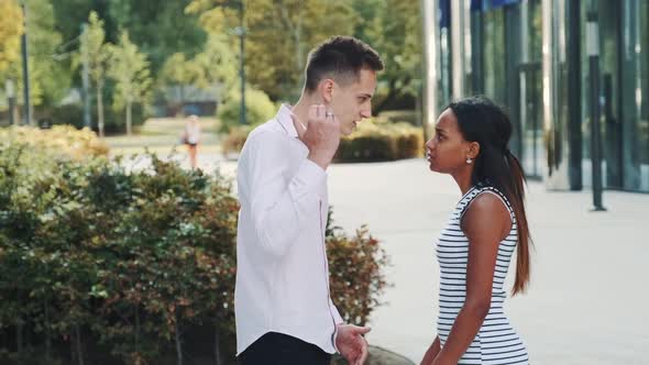 Mixed-race Woman Starts Crying During the Quarrel with Her Boyfriend in the Street.