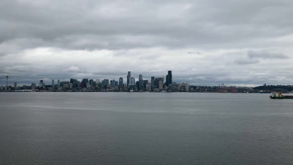 Drone shot with the Seattle, WA skyline in the background on a cloudy spring day.