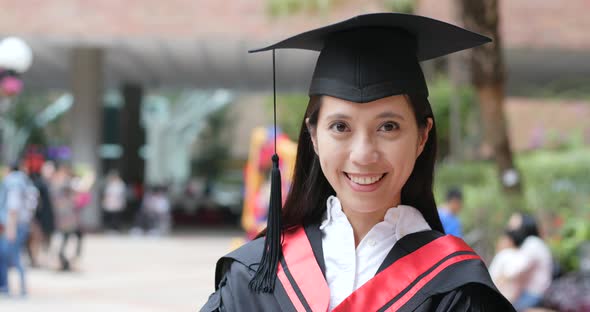 Confident woman get graduated in university