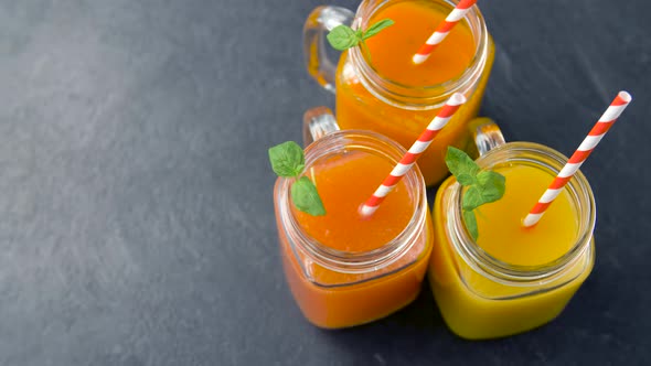 Juices in Mason Jar Glasses with Paper Straws 23