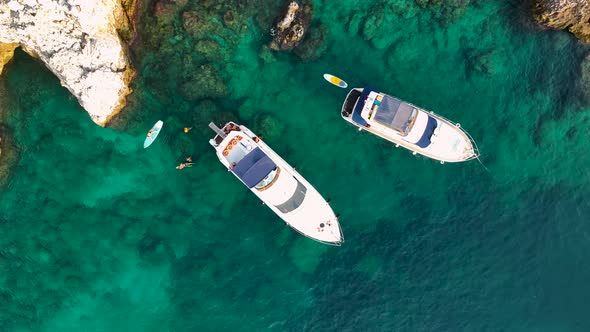 A large yacht stands at sea aerial view 4 K