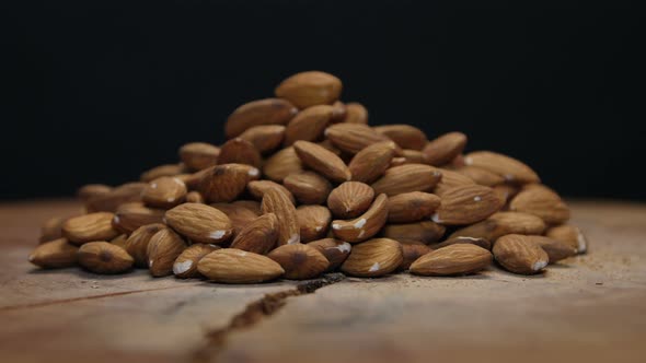 Pile Of Almonds An A Wooden Table