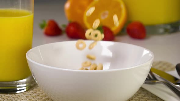 Slow Motion Cereal Being Poured Into A Bowl