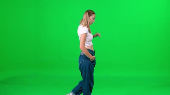 Female Walking Down the Street on a Green Background a Passerby on a Walk Chroma Key Template a Girl