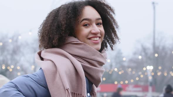 Closeup Young Girl Happy Woman African American Lady with Curly Hair Stylish Hairstyle Stands in