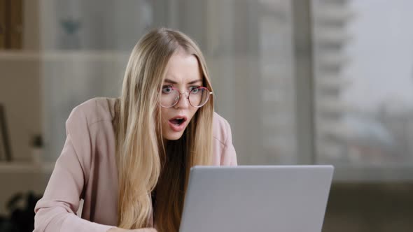 Shocked Caucasian Millennial Business Woman Female Student Worker User Receiving Bad News Message