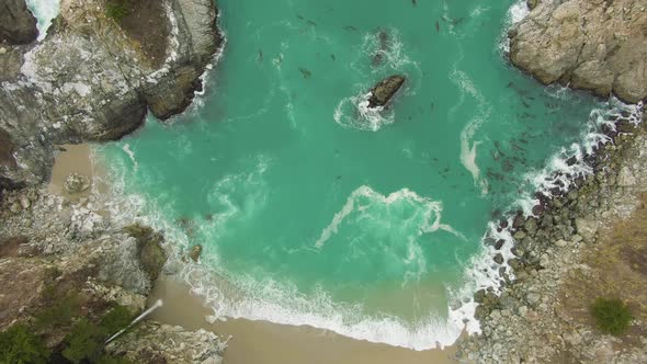 McWay Beach and McWay Falls. Big Sur, California, USA. Aerial Top-Down View