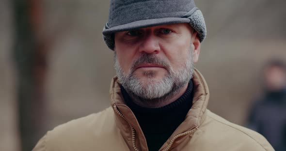 CloseUp Portrait Of Angry Mature Bearded Man