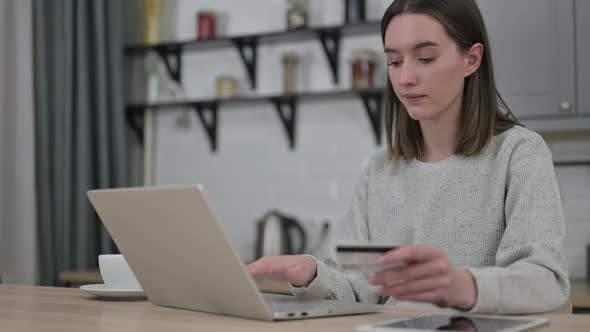 Attractive Young Woman Having Online Payment Success on Laptop