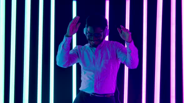 Portrait Young Stylish African American Male Wearing Big White Headphones Smiling Dancing Happily