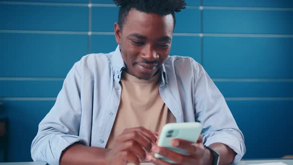 Overjoyed African American Man Rejoicing Good News or Joy of Winning Prize