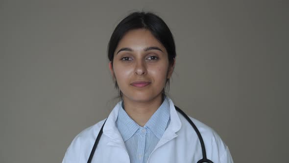 Confident Smiling Indian Female Doctor Wear White Coat Look at Camera Portrait