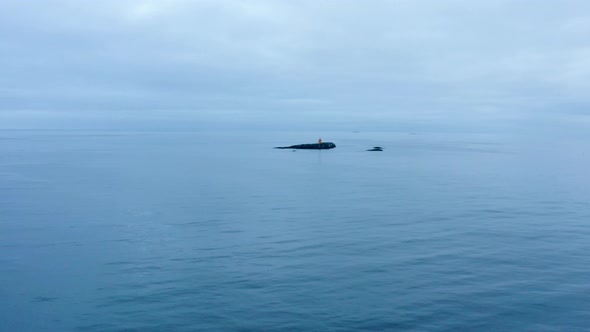 Remote Island In North Atlantic With Flatey Lighthouse, Westfjord, Iceland. Aerial Wide