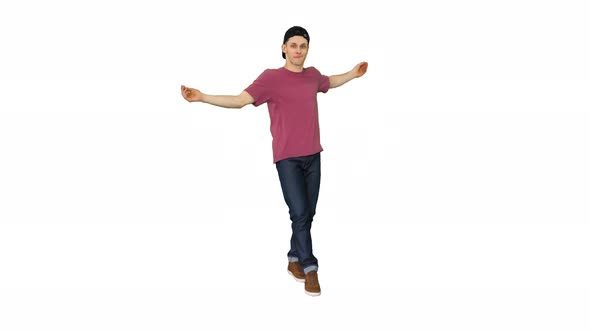 Hip-hop Guy in a Cap Dancing on White Background.