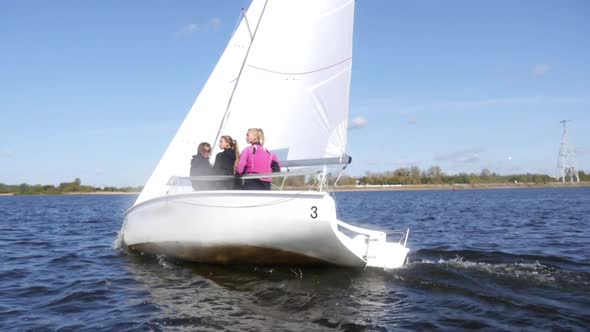 On a Summer Day a Group of Friends Went on a Trip Along the River on a White Yacht. Slow Motion