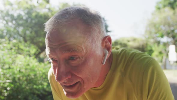 Senior man exhausted after running