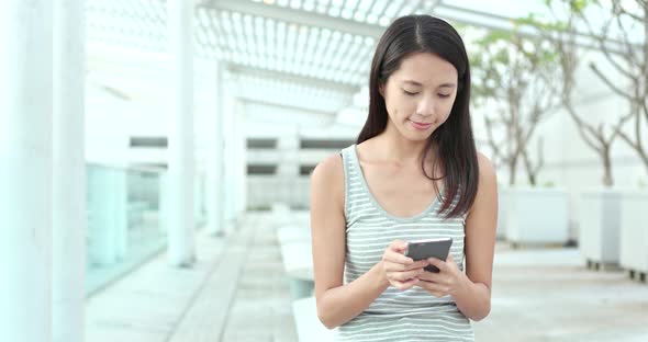 Asian woman using mobile phone 