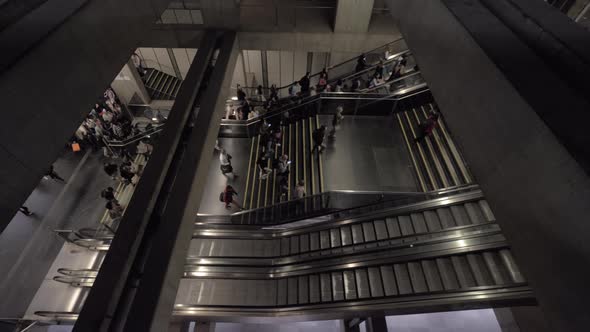 Crowd of people going upstairs in subway