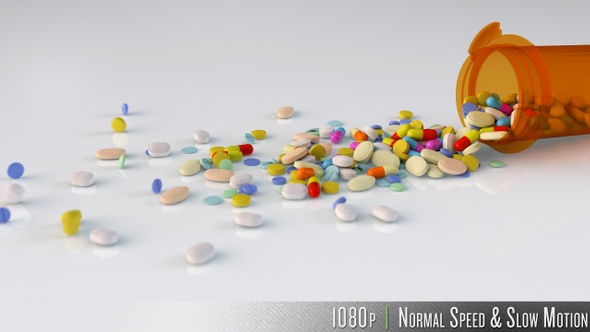 Different Medication Drug Pills Spilling Out of Pill Bottle