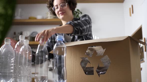 Active Girl Sorts Collects Waste Products Plastic Bottles For Recycling Recycling, Recycling Plastic