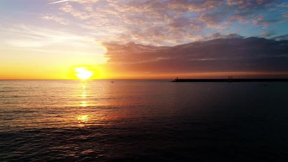 Cloudy Sunset Over the Sea Aerial View 4 K