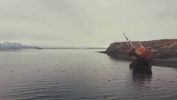 Rusty ship near river coast