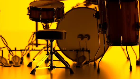 Details of drum kit on a bright yellow background. Percussion chrome hardware.
