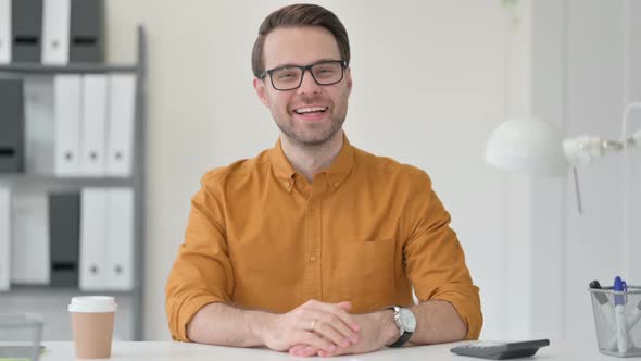 Young Man Talking on Video Chat