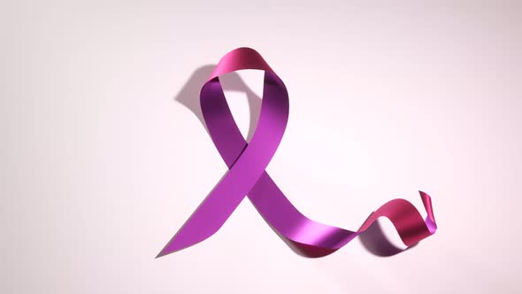 Beautiful shiny pink ribbon symbolizing breast cancer awareness. Moral support.