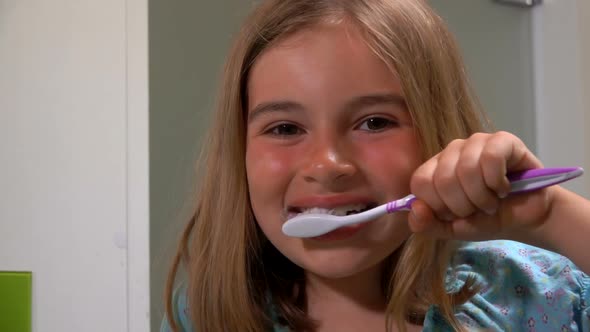 Girl Cleans His Teeth