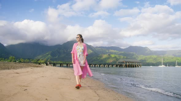 Free Woman at Beach Walk on Tropical Hawaii Island Mountain on Background Kauai