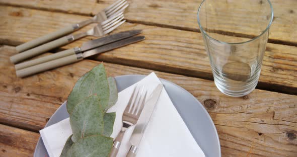 Various cutlery on wooden table 4k