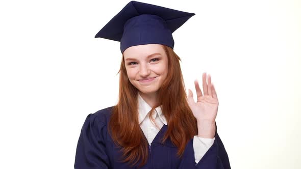 Beautiful Young Ginger Caucasian Girl in Blue Academical Dress Standing Smiling on White Background