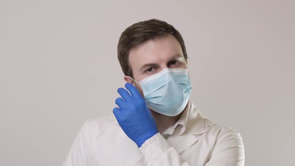 Smiling Microbiologist at White Background. Medical Worker in , UHD