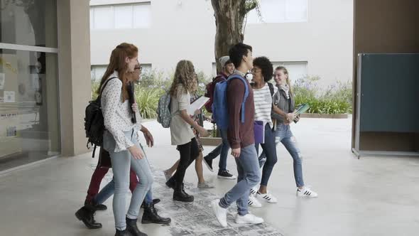 College students walking together in campus