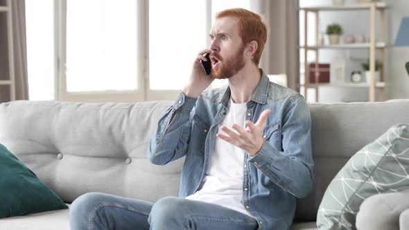 Angry Man Yelling While Talking on Phone