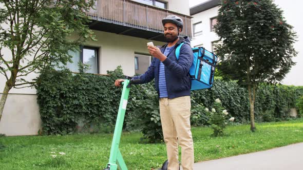 Delivery Man with Phone and Bag Riding Scooter