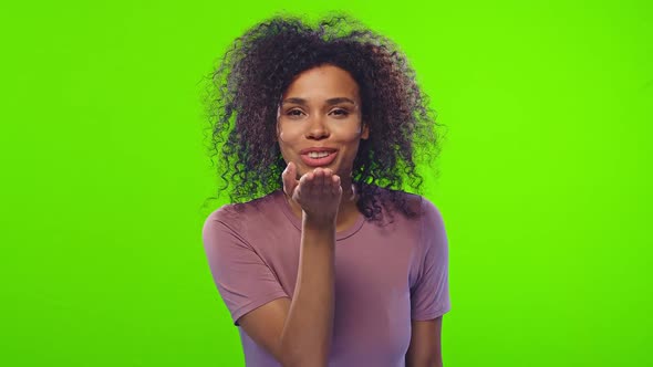 African Woman Blows Air Kiss To Beloved Boyfriend Over Chroma Key Background