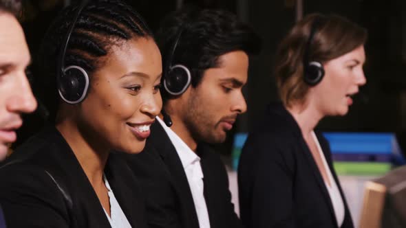 Business executives using headsets