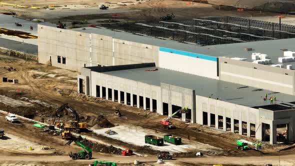 7x Zoom Drone Footage Of A Amazon Fedex Ups Distribution Center Under Construction