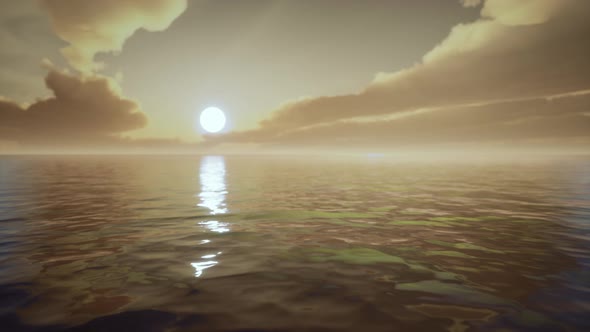 Twilight Sky in Colorful Bright Sunlight Reflects Off on the Water Surface alt