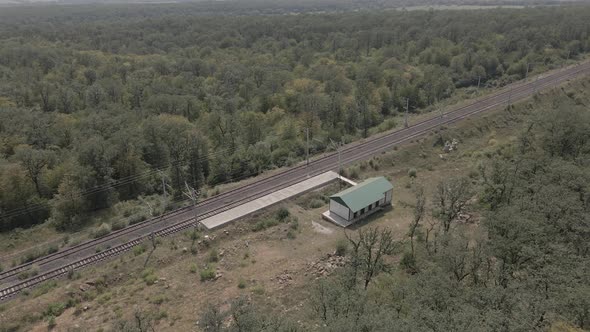 Samtskhe-Javakheti, Georgia - August 20 2021: Aerial view of small railway station near Tetritskaro