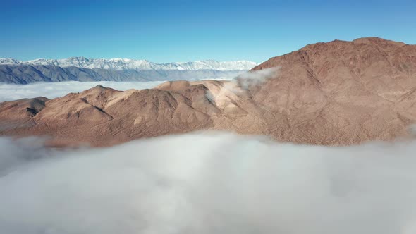 Beautiful Aerial Flying Above the Death Valley Covered By Clouds at Sunrise, 
