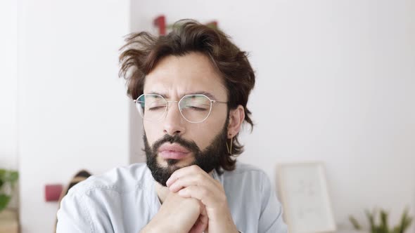 Successful Businessman Looking Away Daydreaming While on a Break From Work