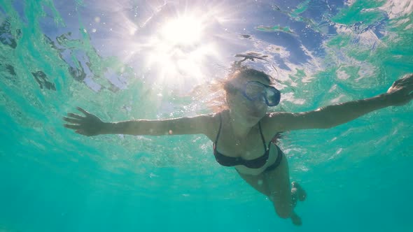 Gorgeous Lady Being Happy While Swimming Underwater