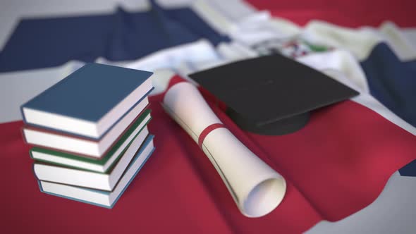 Graduation Cap and Diploma on the Flag of the Dominican Republic